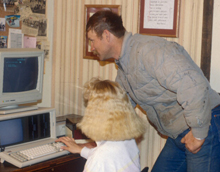photo of couple at computer