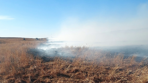 a pasture burning