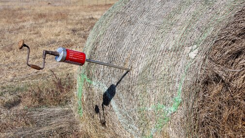 Hay probe in a round bale.