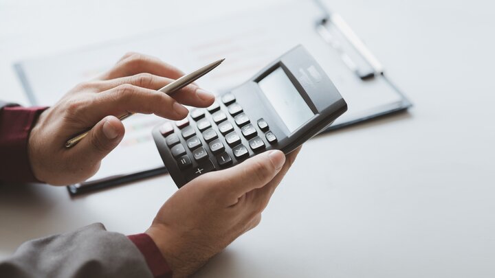 Figuring costs on a calculator