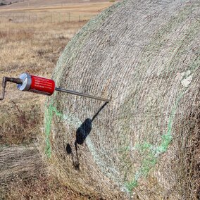 Hay probe in a round bale.