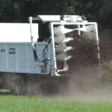 Truck applying manure to a field