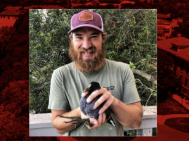 Dave Sandahl holds a bird