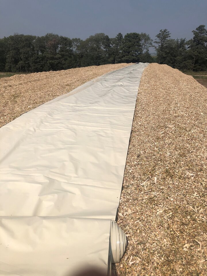 silage pile cover rolling out