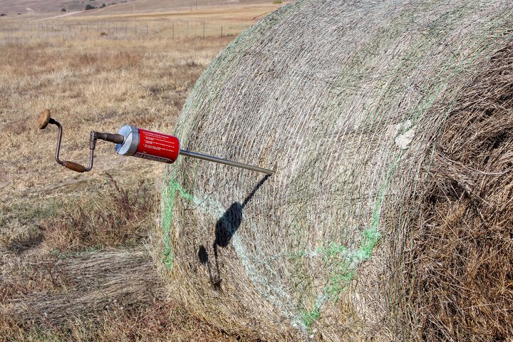 Hay probe in a round bale.